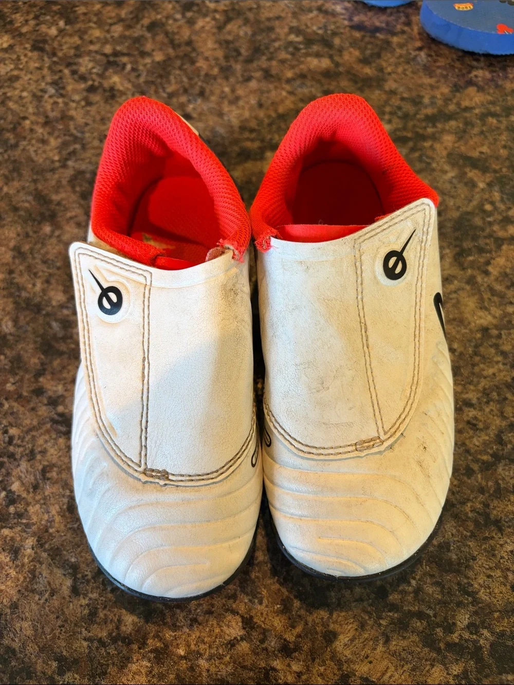 Nike Kids White Slip-On Soccer Cleats with Red Interior
